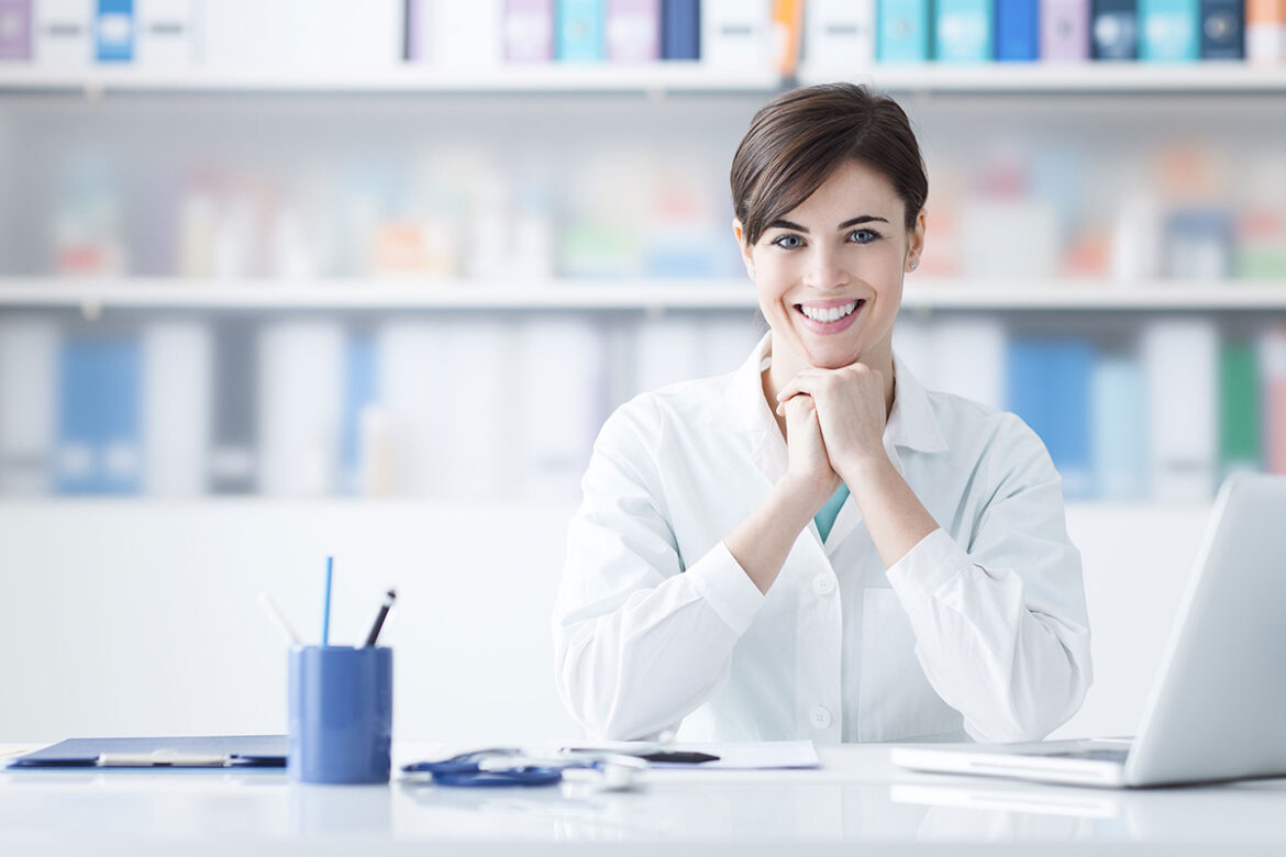 Doctor working at office desk